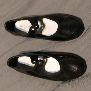 Spotlights black tap dance shoes